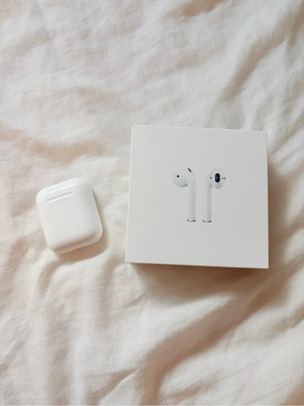 Apple AirPods with Charging Case - White